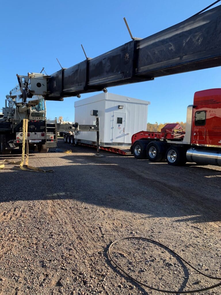 An electrical building being loaded up onto a semi trailer to be shipped off to one of our clients.