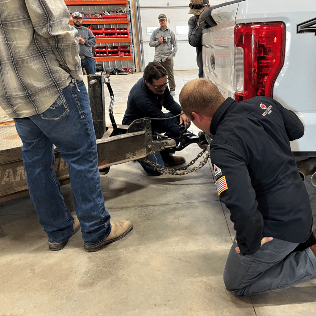 Joe teaching how to load equipment and how to hook up a trailer