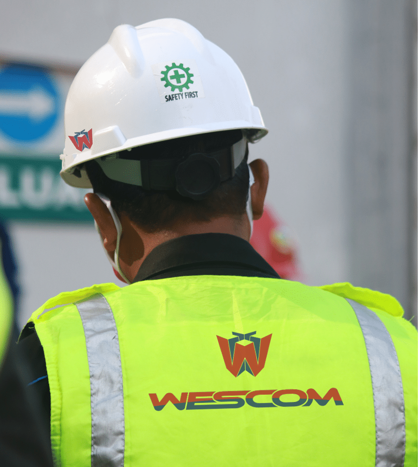 man from behind wearing Wescom safety gear